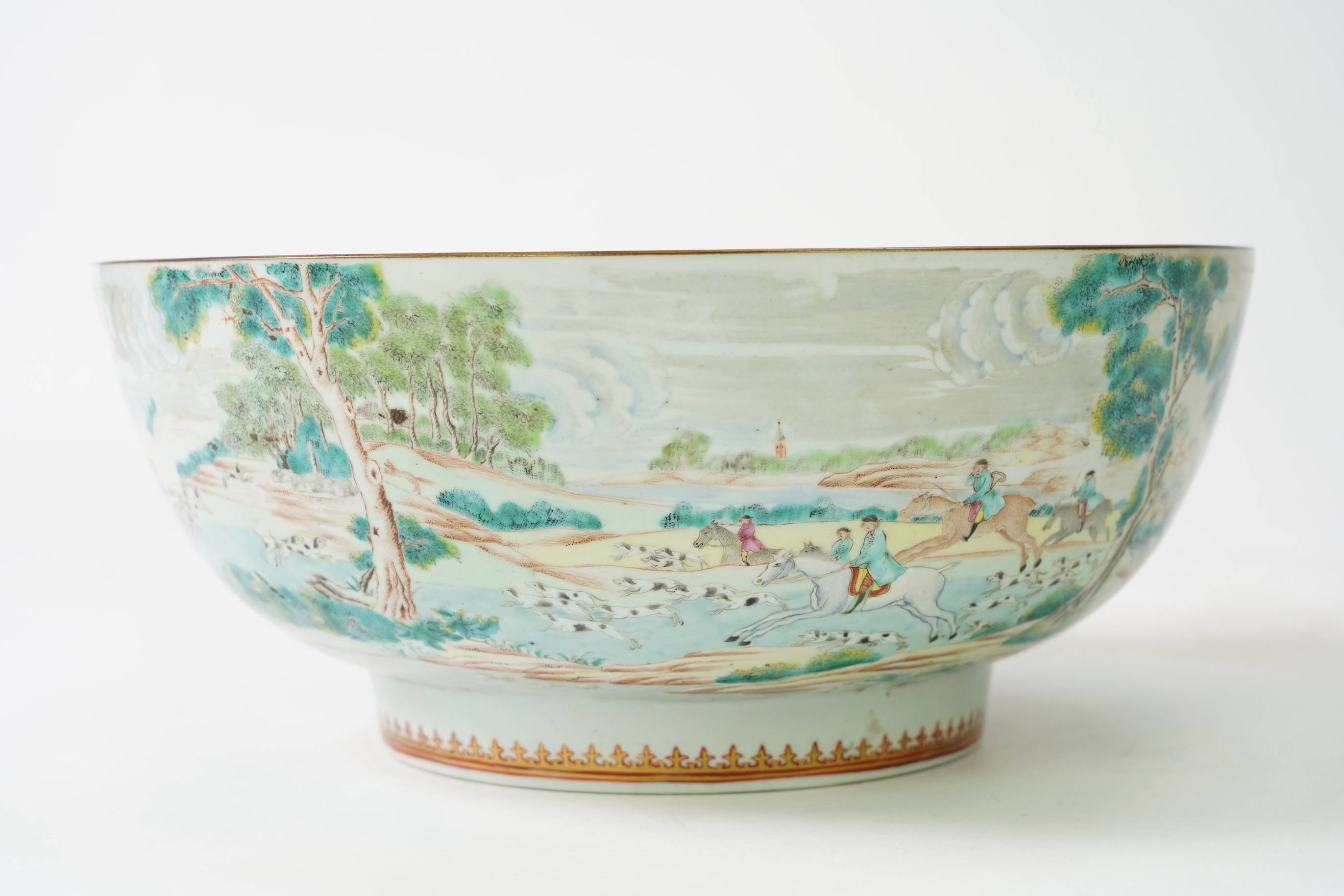 A large Chinese European subject ‘hunting’ punch bowl, Qianlong period